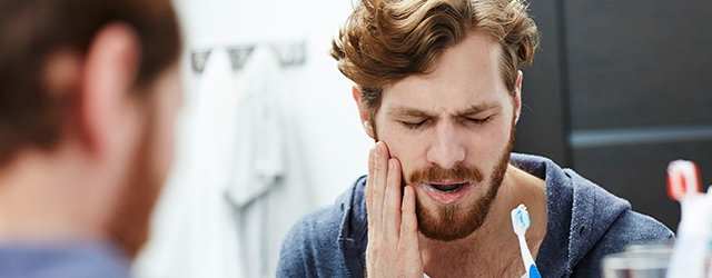 Os sintomas da periodontite